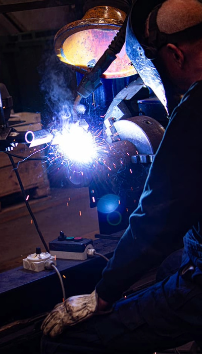 Expert marine boiler repair in vessel engine room.
